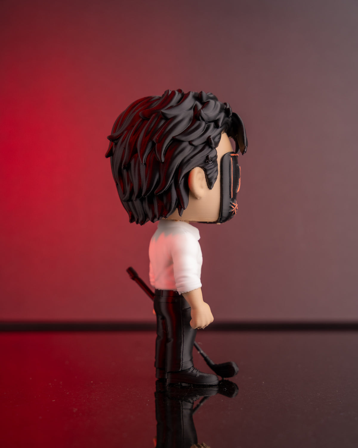 The Masked Wrath figure in white shirt — dark romance collectible