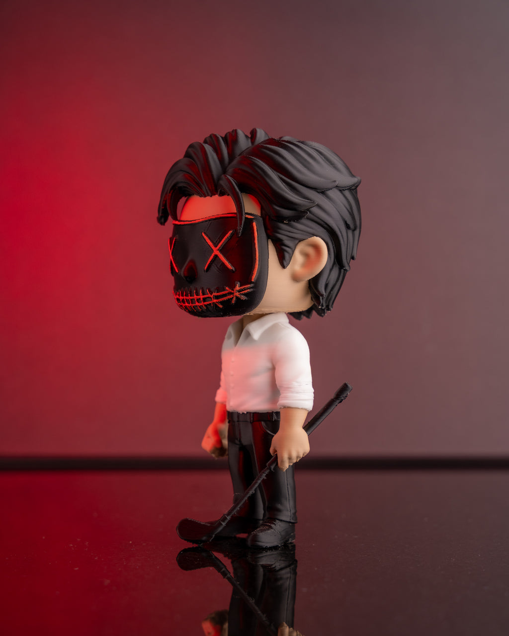 The Masked Wrath chibi figure with stitched mask, hand-finished in Chur, Switzerland