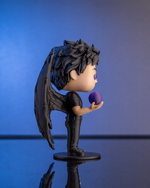 The Lord of Stars chibi figure with wings spread, hand-finished in Chur, Switzerland